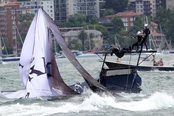 Coopers 62-Rag and Famish Hotel, one of many skiffs to capsize on a wild day &copy; Frank Quealey /Australian 18 Footers League http://www.18footers.com.au